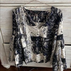 Abstract print top with flared sleeves